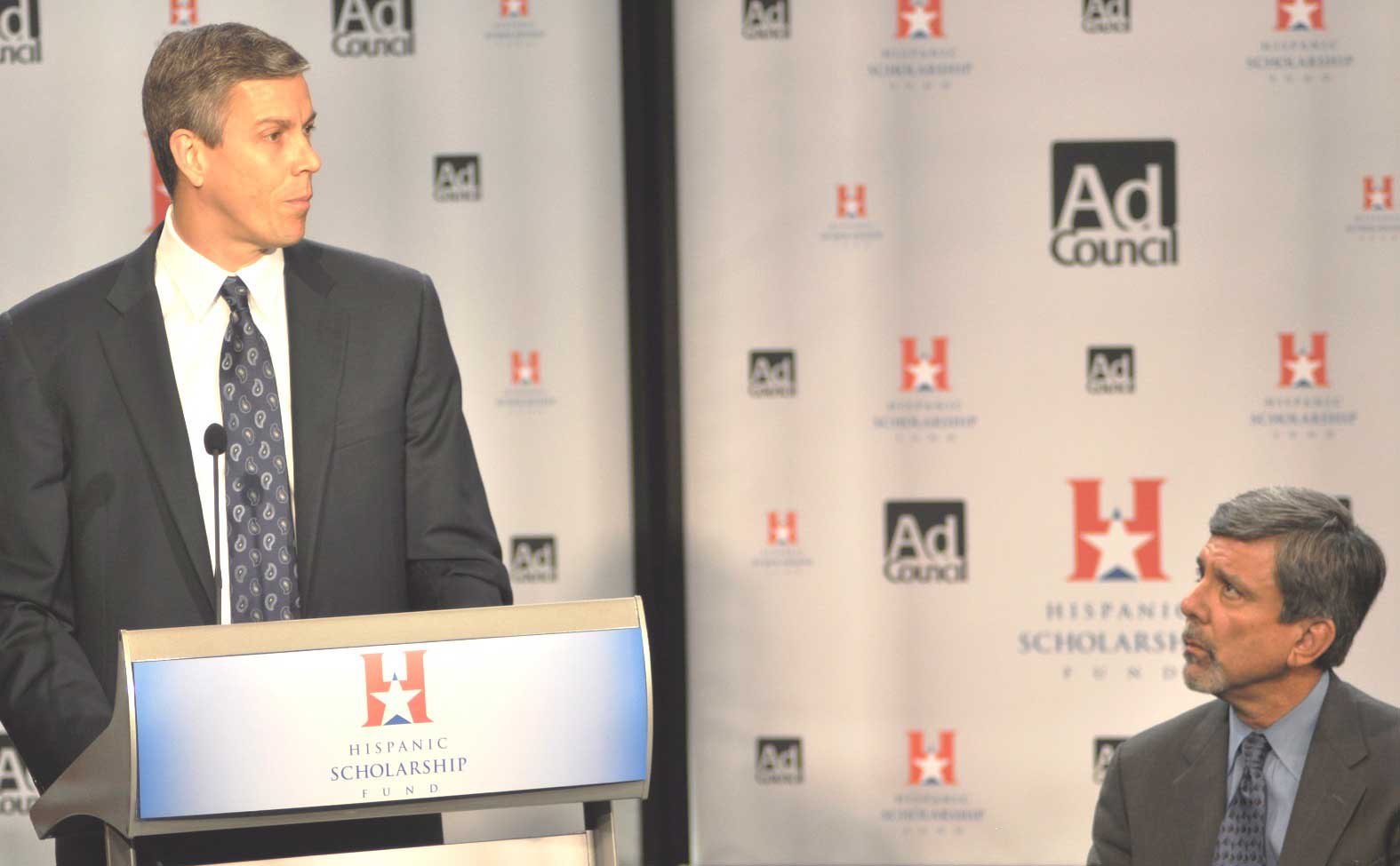 U.S. Education Secretary Arne Duncan (left)