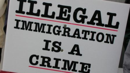 112013_illegal_immigrant_sign