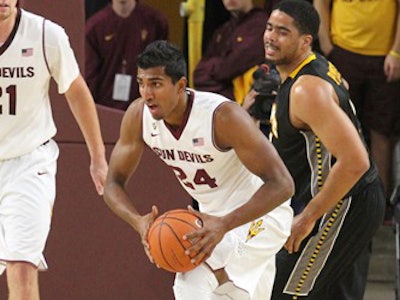 Arizona State’s Sai Tummala, with the basketball, wants to be a doctor and is leaning toward orthopedics.