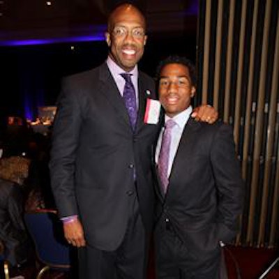 Dr. Michael J. Sorrell, president of Paul Quinn College, left, in Dallas with Kevin Lee, a sophomore. Sorrell instituted a business-casual dress policy for the HBCU and developed a Clothes Closet that students can visit and pick out free attire to wear to job interviews, classes and internships.