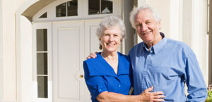 home-fit-couple-in-front-of-home-istock_000008533204small-monkeybusinessimages