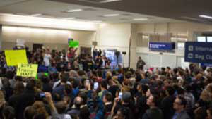 170129122904-trump-travel-ban-protests-dallas-medium-plus-169