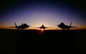 f22-raptor-fighter-planes-at-sunset