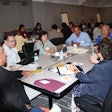 Tribal College and University presidents engage in a group discussion.
