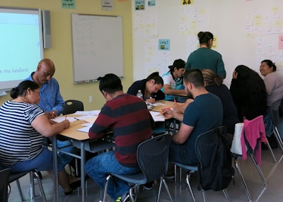 Briya students working in groups.