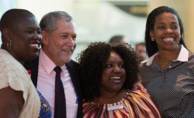 Dr. Carlos Vargas-Aburto, second from left, welcomes new minority faculty and staff at a reception. (Photo courtesy of Southeast Missouri State University)