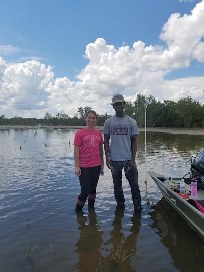 Andrea Orozco and Philip Bellamy, students at Bethune-Cookman University, doing fieldwork in coastal resilience.