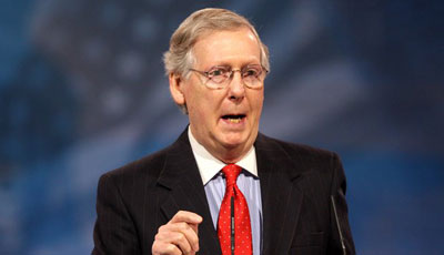 mitch-mcconnel-with-diverse-military-12-6-17