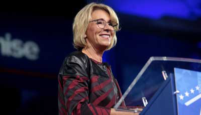 betsy_devos_33133710915-with-diverse-military-1-8-18