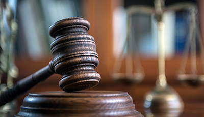 Law and Justice concept. Mallet of the judge, books, scales of justice.