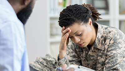 Female soldier with PTSD seeks counseling