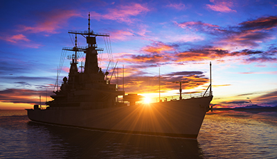 American Modern Warship On The Background Of Sunset