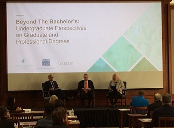 Panelists Dr. John Valery White (left) and Kent Syverud discuss study findings with moderator Kellye Testy.