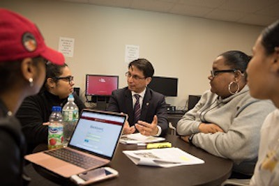 Dr. Frank D. Sánchez with RIC students
