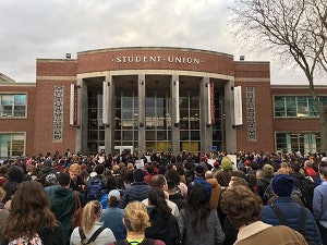 UMass students, faculty and community members at the campus walkout in front of the Student Union.