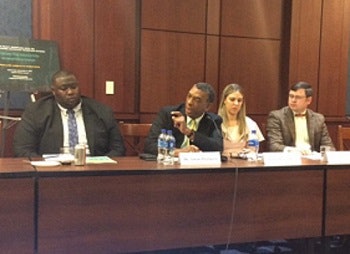 Dr. Aaron Thompson (center) makes a point during the roundtable discussion.