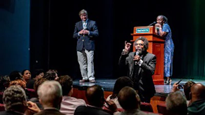 Dr. Cornel West speaks at the ‘Race Matters@25’ conference at Dartmouth College as Dartmouth professor Donald Pease and keynote speaker Dr. Farah Griffin look on.