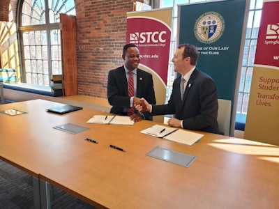 Elms College president Dr. Harry Dumay, left, and Springfield Technical Community College president Dr. John Cook