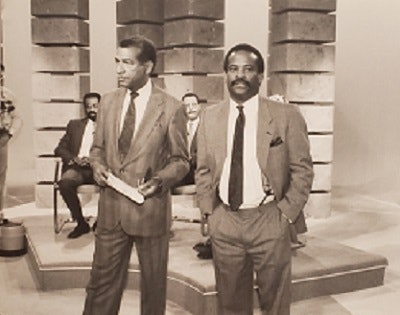 Cox and Matthews at a teleconference in the early days.