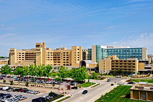 Exterior photo of University Hospital with new patient care tower addition.