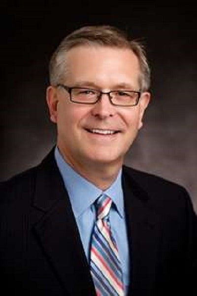 Dr. John Raymond