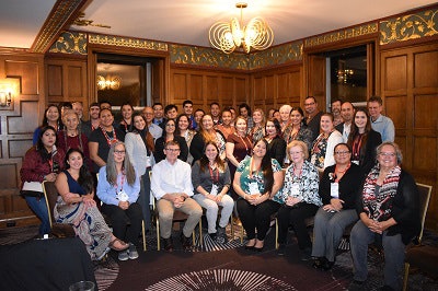 Sloan Indigenous Graduate Partnership staff gather for an annual meeting.