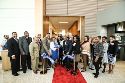 Dr. Charlene Dukes cuts the opening ribbon to the Culinary Arts Center.