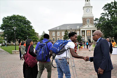 Morgan State University president David K. Wilson greets students on campus pre-COVID-19 (Photo: Morgan State University)