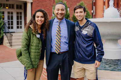Queens University of Charlotte President Daniel Lugo with students.