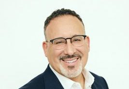Dr. Miguel Cardona