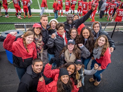 Dr. Susan Cole celebrates homecoming with students.