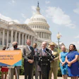 Sen. Chris Coons speaks at the IGNITE announcement in Washington, D.C., with Rep. Alma Adams standing behind him.
