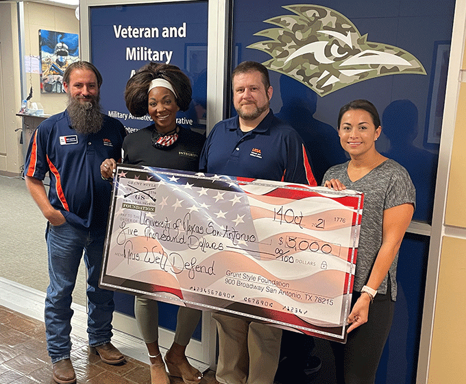From left to right: Will Lansdon, UTSA Veteran and Military Affairs (VMA); Tiffany Orner, Grunt Style; Michael Logan, VMA; and Jessica Lerma, Grunt Style; with the $5,000 check from the Grunt Style Foundation.