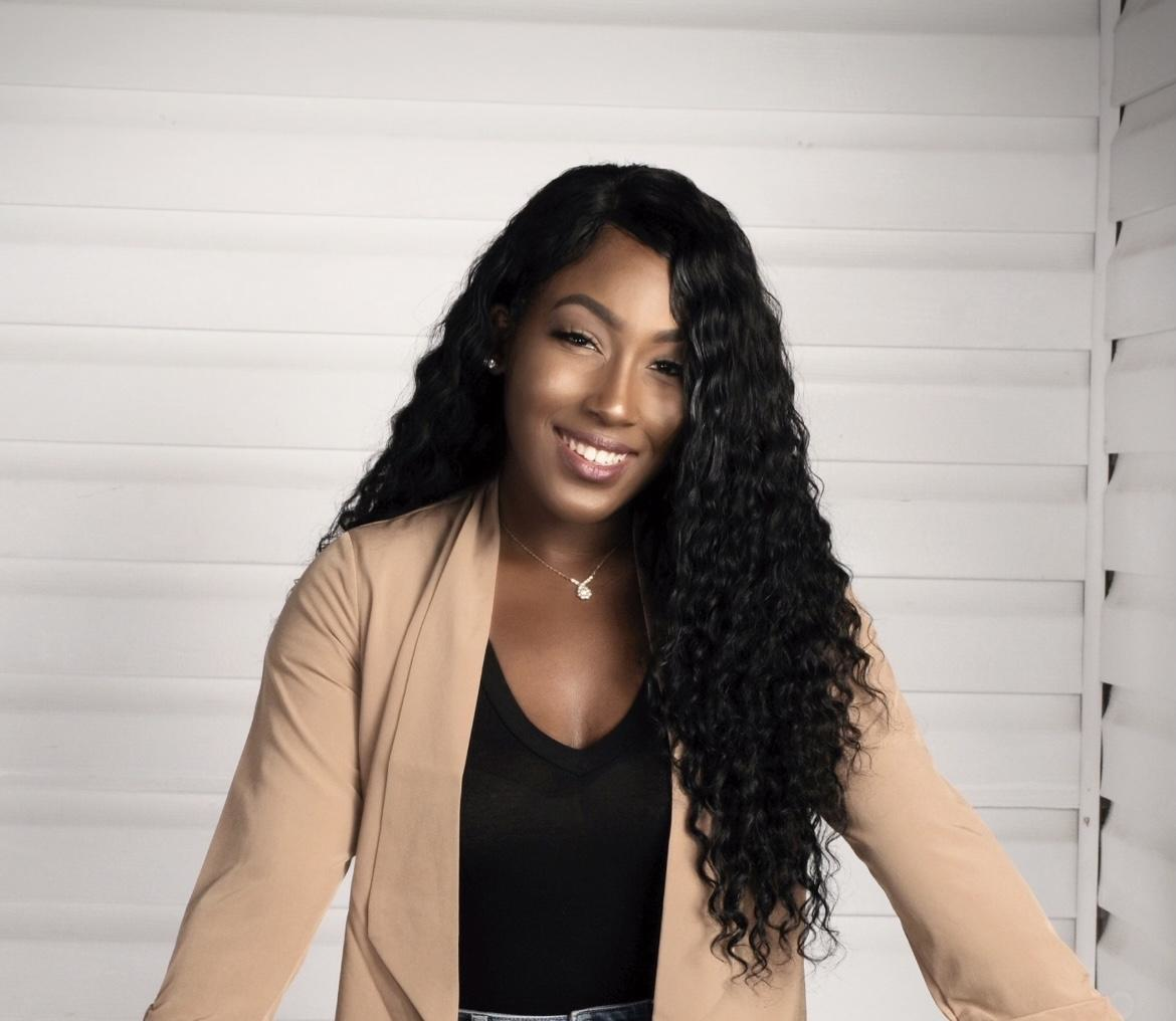 Corinne Dorsey, the winner of the 2022 White House Correspondents' Association Harry McAlpin scholarship.