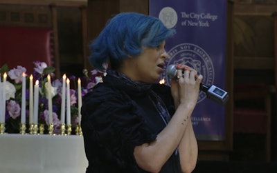 Alumni Lee Burgos sings a tribute.
