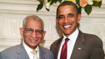 Dr. William E. Cox, left, and former U.S. President Barack Obama.