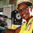 Companies and community colleges are partnering to train future STEM-field workers like Bianca Wilson, shown at the Norfolk Naval Shipyard.