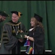 A screenshot of the moment Samantha Lynn Motto walked across the stage wearing her pride gear. This moment was later edited out from the official video shared by the school.