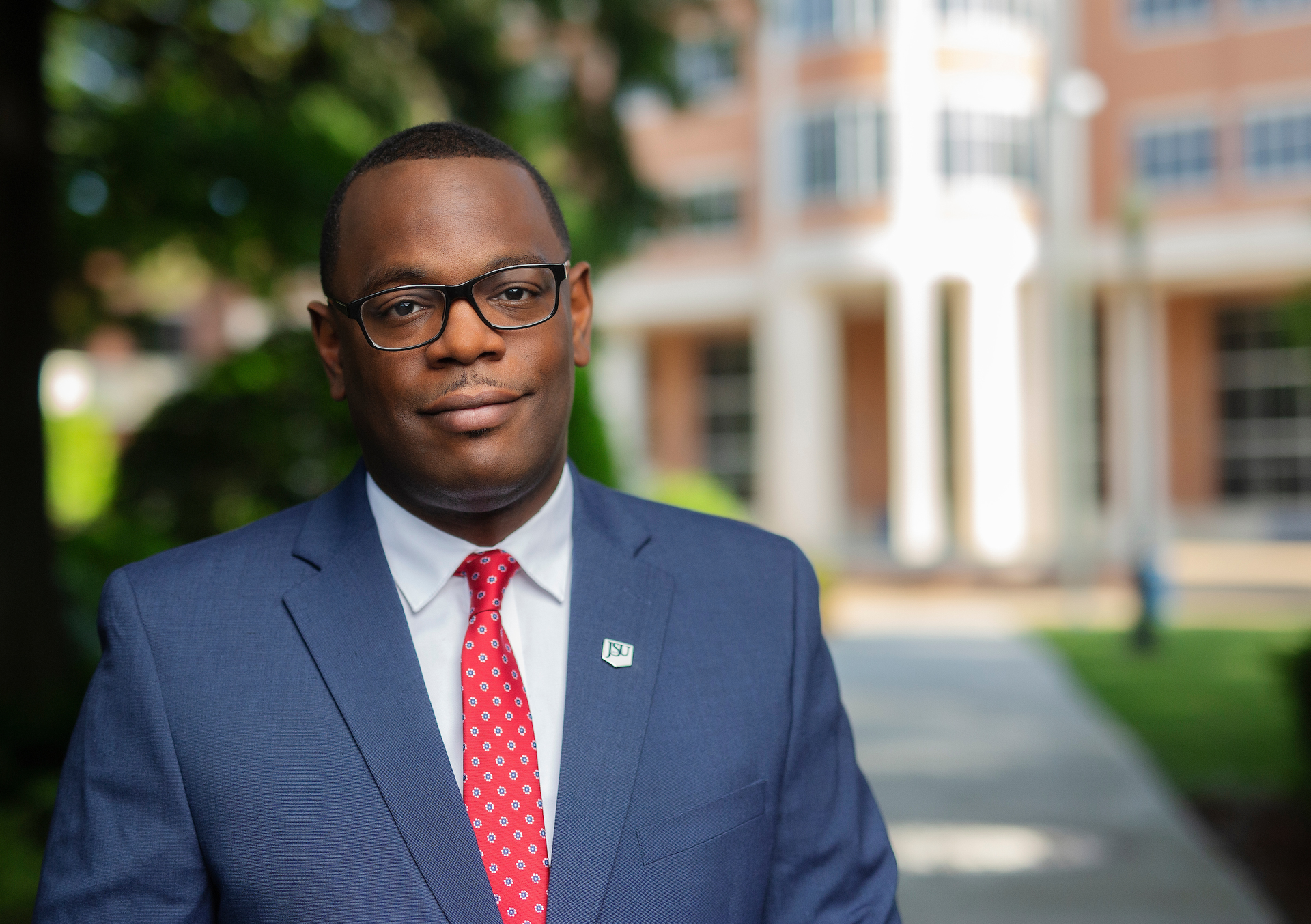 Jackson State University President Thomas K. Hudson, above, says the university will continue its mostly voluntary masking, vaccines, and testing protocols this fall to combat the spread of COVID-19.