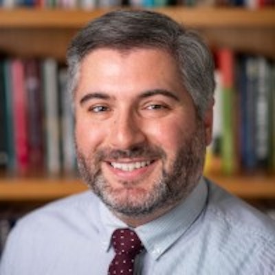 Dr. Adam Gismondi, director of impact for the Institute for Democracy and Higher Education