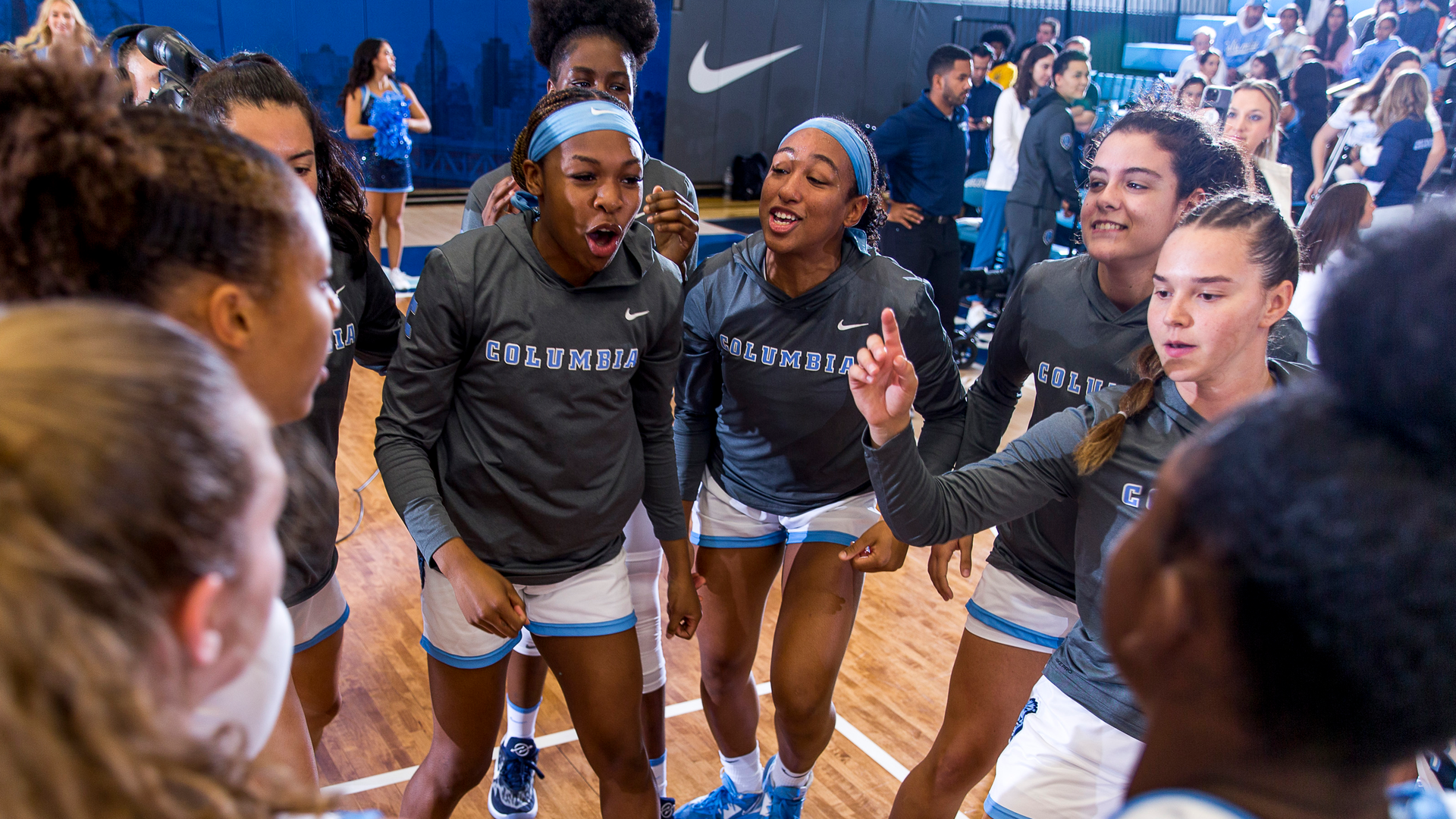 Columbia University women&rsquo;s basketball team huddles before a game.
