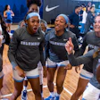 Columbia University women’s basketball team huddles before a game.