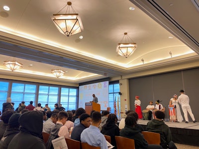 Dr. Daniel Jean prepares to speak, as Cultura Lovers and the NJ Bomba Collective perform.