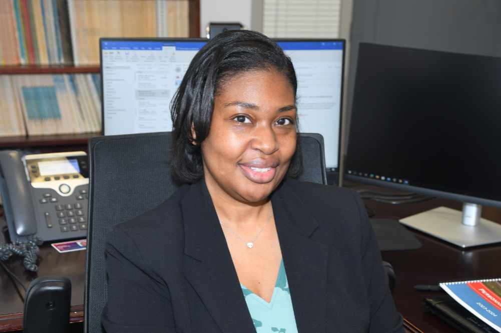 Dr. Genita Mangum