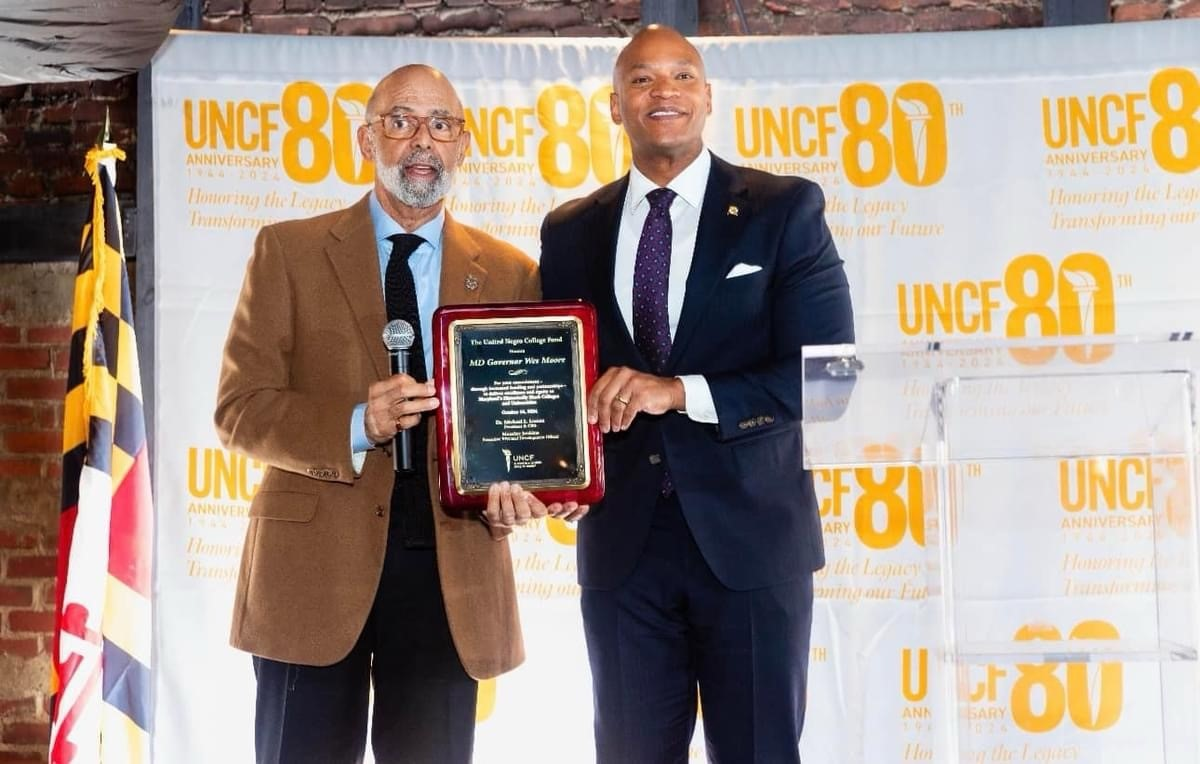 Dr. Michael Lomax, president and CEO of United Negro College Fund (UNCF), presents award to Maryland Governor Wes Moore.