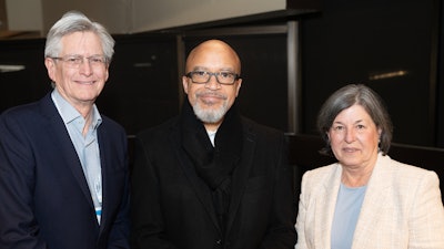 Members of Achieving the Dream’s board of directors, Larry Kubal, treasurer (left), and Dr. Gregory D. Williams, chair, with ATD President and CEO Dr. Karen A. Stout