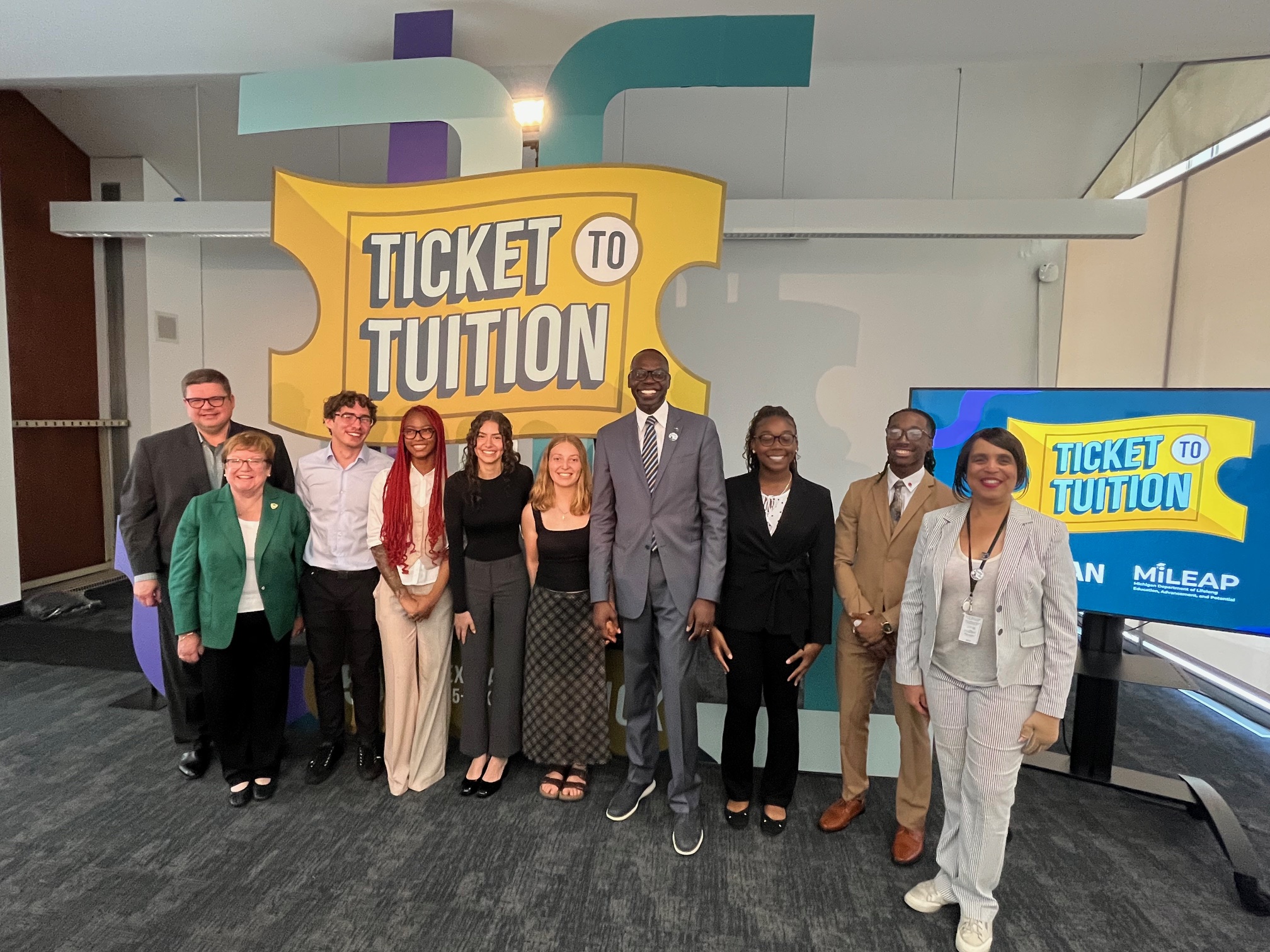 From left: Ryan Fewins-Bliss, Michigan College Access Network;Dr. Laurie Claybo, Wayne State University;Lukas Gojcaj, student winner;Lamya Robinson, student winner, Cadie Benedict, student winner, Graceful Tompkins, student winner;Lt. Gov. Garlin Gilchrist II;Ah'ja McCoy, student winner;Nathan Herbert, student winner and Dr. Beverly Walker-Griffea, Michigan Department of Lifelong Education, Advancement, and Potential.
