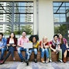 Depositphotos 115687282 Stock Photo College Students Using Wireless Devices