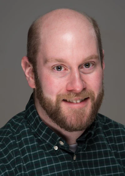 Kevin Glover is an Associate Professor of Political Science and Honors at the University of Maine.