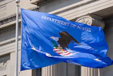 Our Work Graphic Doj Flag